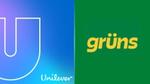 Unilever and Grün’s logos on blue and green background.