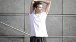 Man with one arm raised so you can see his armpit