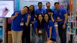 Unilever South Korea team members stand under a Unilever Korea banner