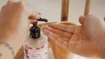 A person using Love Beauty and Planet handwash