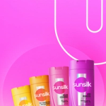 Four brightly coloured Sunsilk shampoo bottles in yellow, pink, orange, and purple are lined up against a vibrant pink background with bold curved white graphic lines.