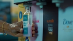 A Unilever refill machine, selling Dove, Lifebuoy and Sunsilk