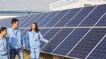 impact of climate change on agriculture in india case study Unilever employees walking next to solar panels.