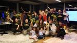 Group of people holding sunflowers