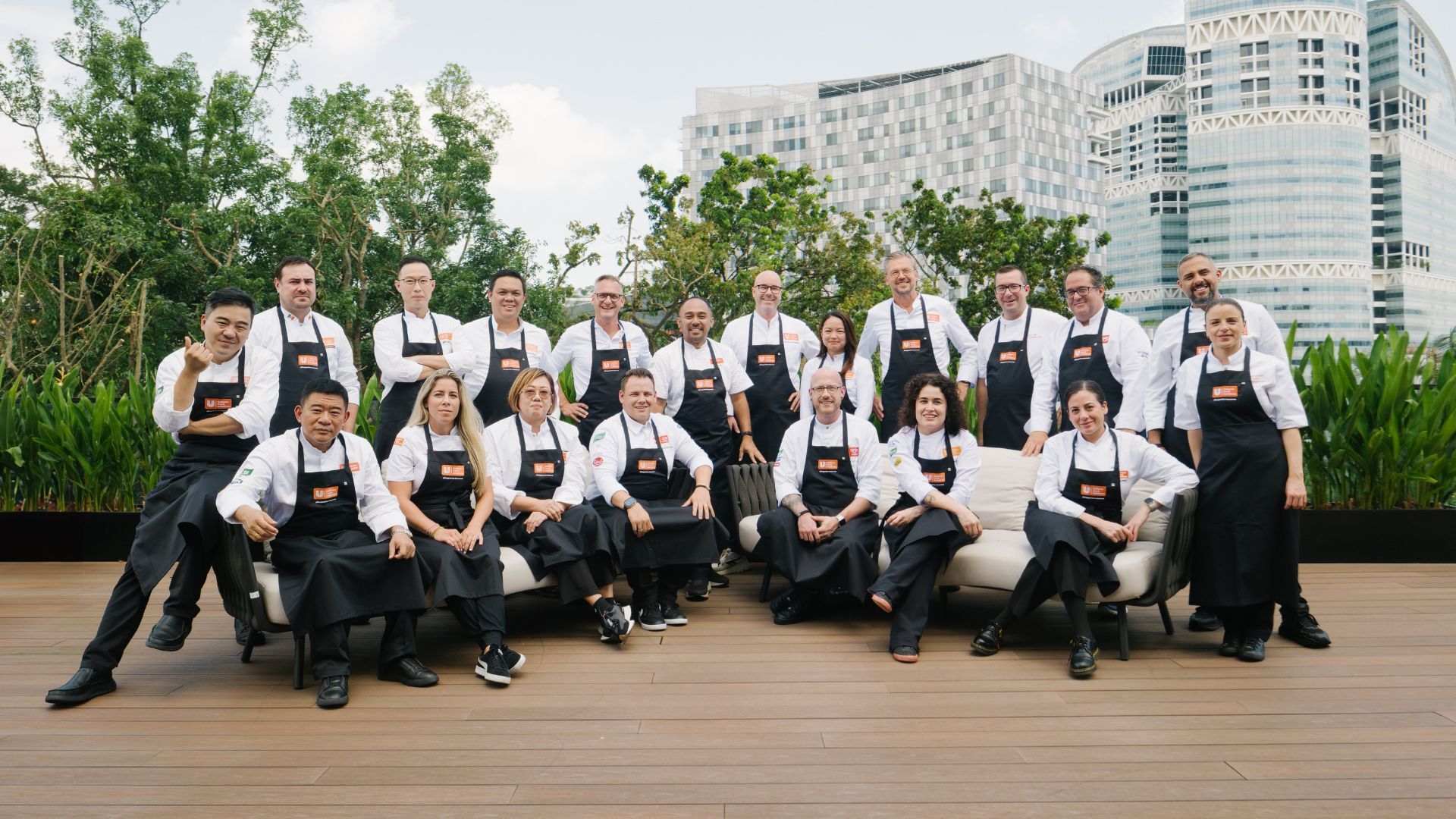 Group shot of Unilever Food Solutions chefs in white uniforms.