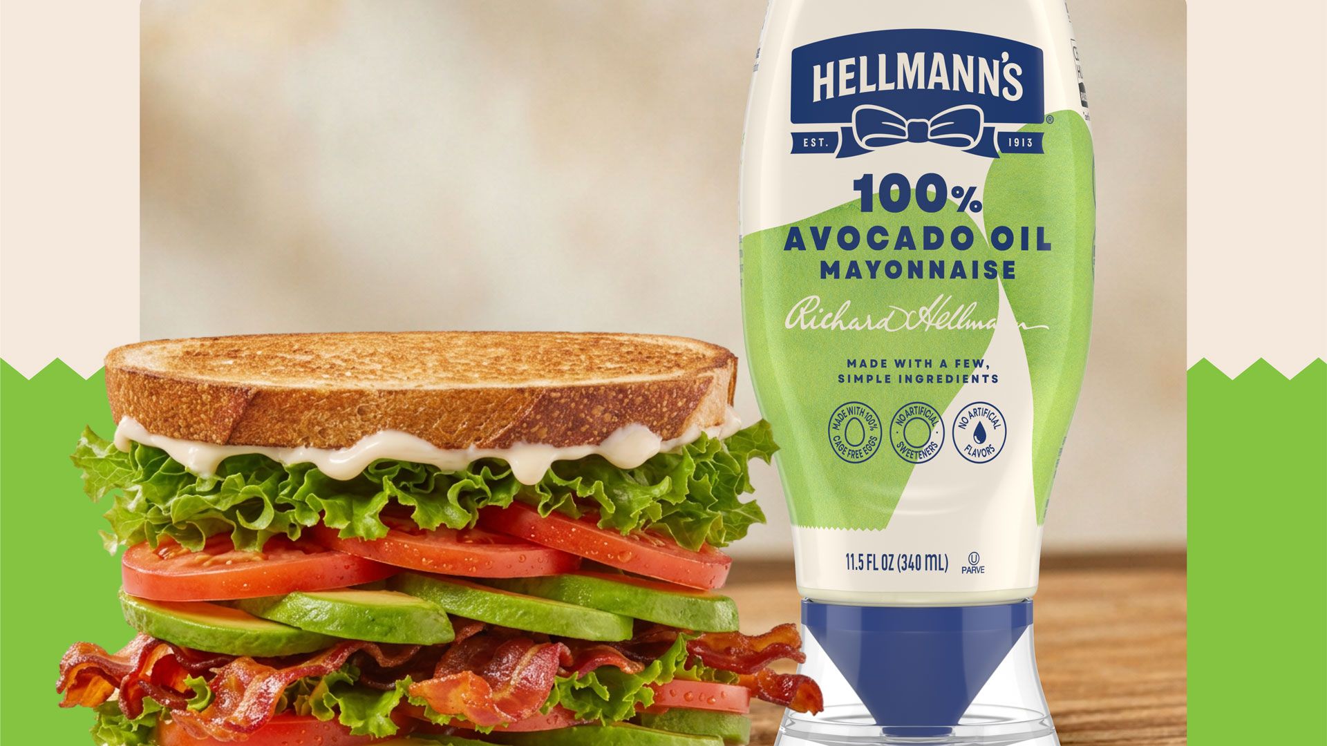 BLT sandwich with avocado beside a bottle of Hellmann's avocado oil mayonnaise.
