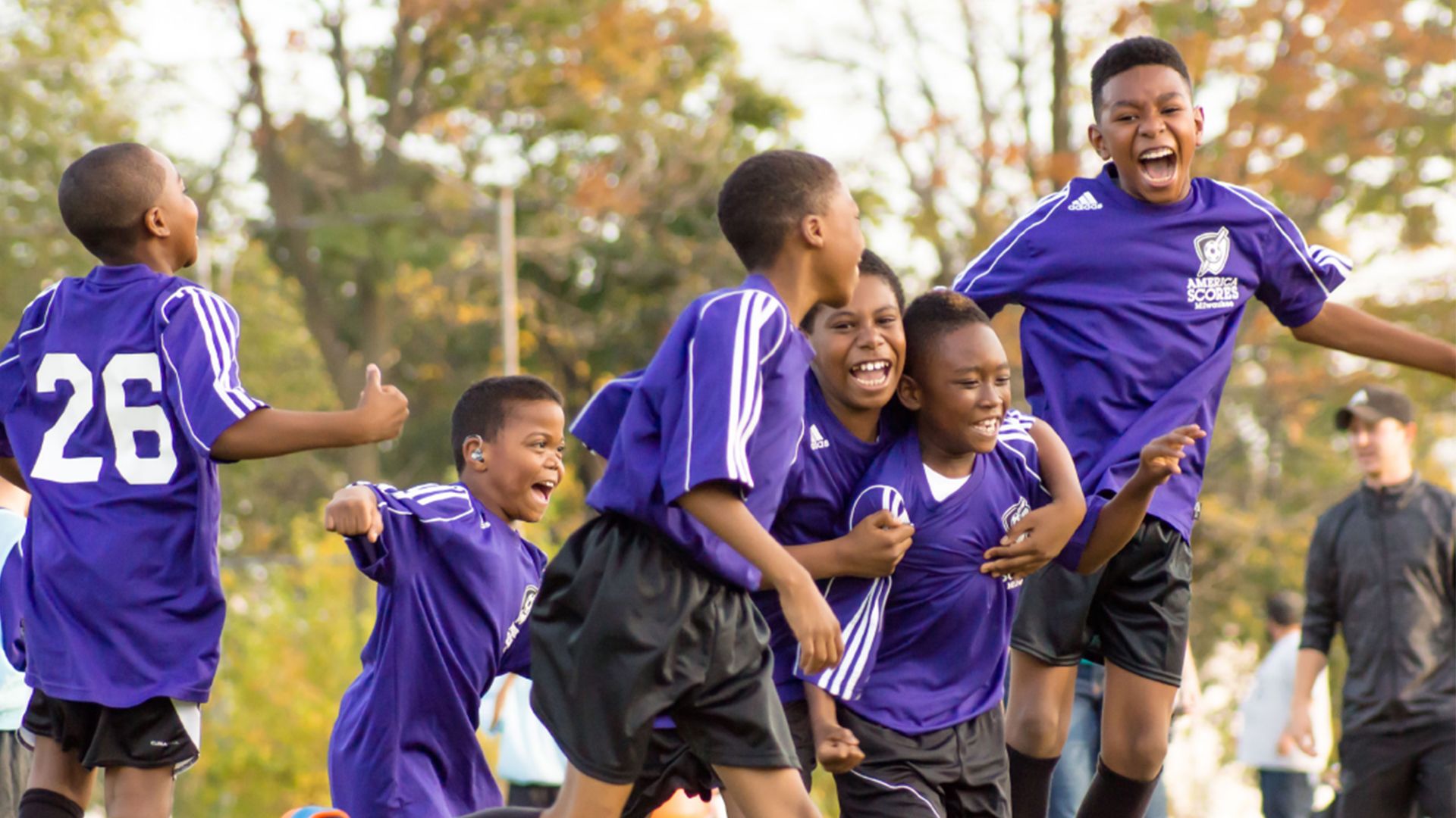 Children celebrating playing sports