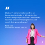 A quote about Lifebuoy’s transformation in skin protection is displayed on a blue gradient background, attributed to Parnil Sarin, Global Brand Director. A person in a bright pink blazer stands at the bottom right