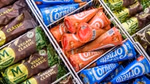 Overhead view of various Magnum and Cornetto ice creams in a freezer cabinet.
