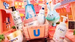 An image advertising Unilever’s e-commerce stores in China. Products from Lux and Dove are featured, along with a cute kawaii rabbit