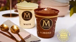 Almond and white chocolate Magnum ice cream in tubs made from recycled plastic.