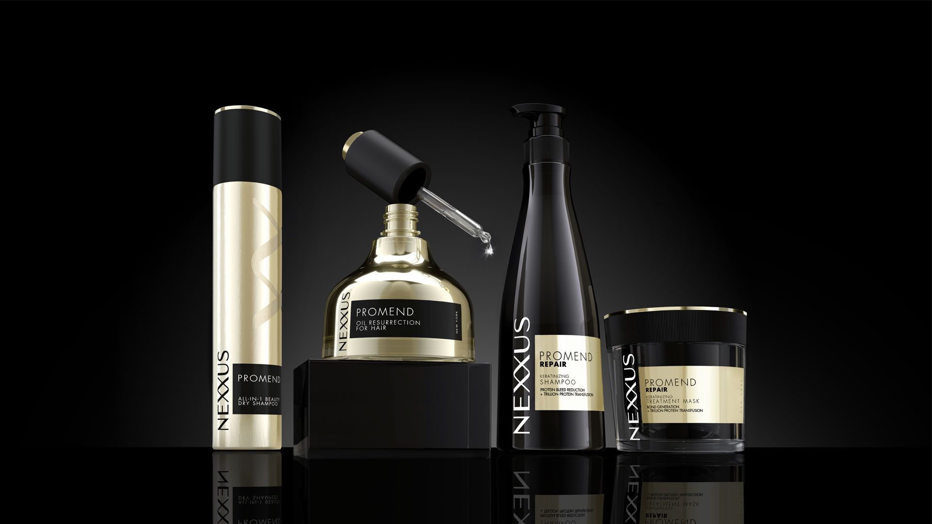 Four NEXXUS Promend hair care products displayed on a glossy black surface against a black background, including a gold bottle, a gold serum bottle with dropper, a black shampoo bottle, and a black and gold hair mask jar.