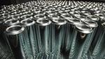 Aluminium cans are lined up ready to be supplied to Unilever for aerosols packaging.