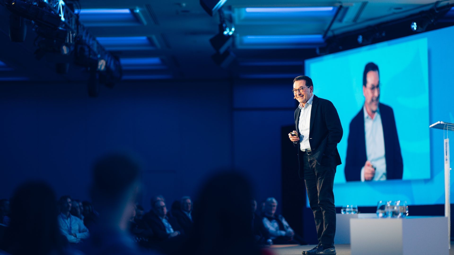 Fabian Garcia, President of Unilever Personal Care, wearing a yellow tunic and holding a lantern on a visit to Indonesia