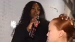 Session stylist Lacy Redway applies TRESemmé hairspray to models’ hair backstage at New York Fashion Week.