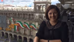 Unilever Hero Elaine Molina sitting on a outdoor table