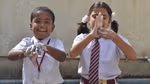 Children washing their hands
