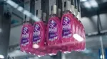 Bottles of Persil Wonder Wash on a Unilever factory production line.