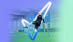 Football player with one leg, kicking a football
