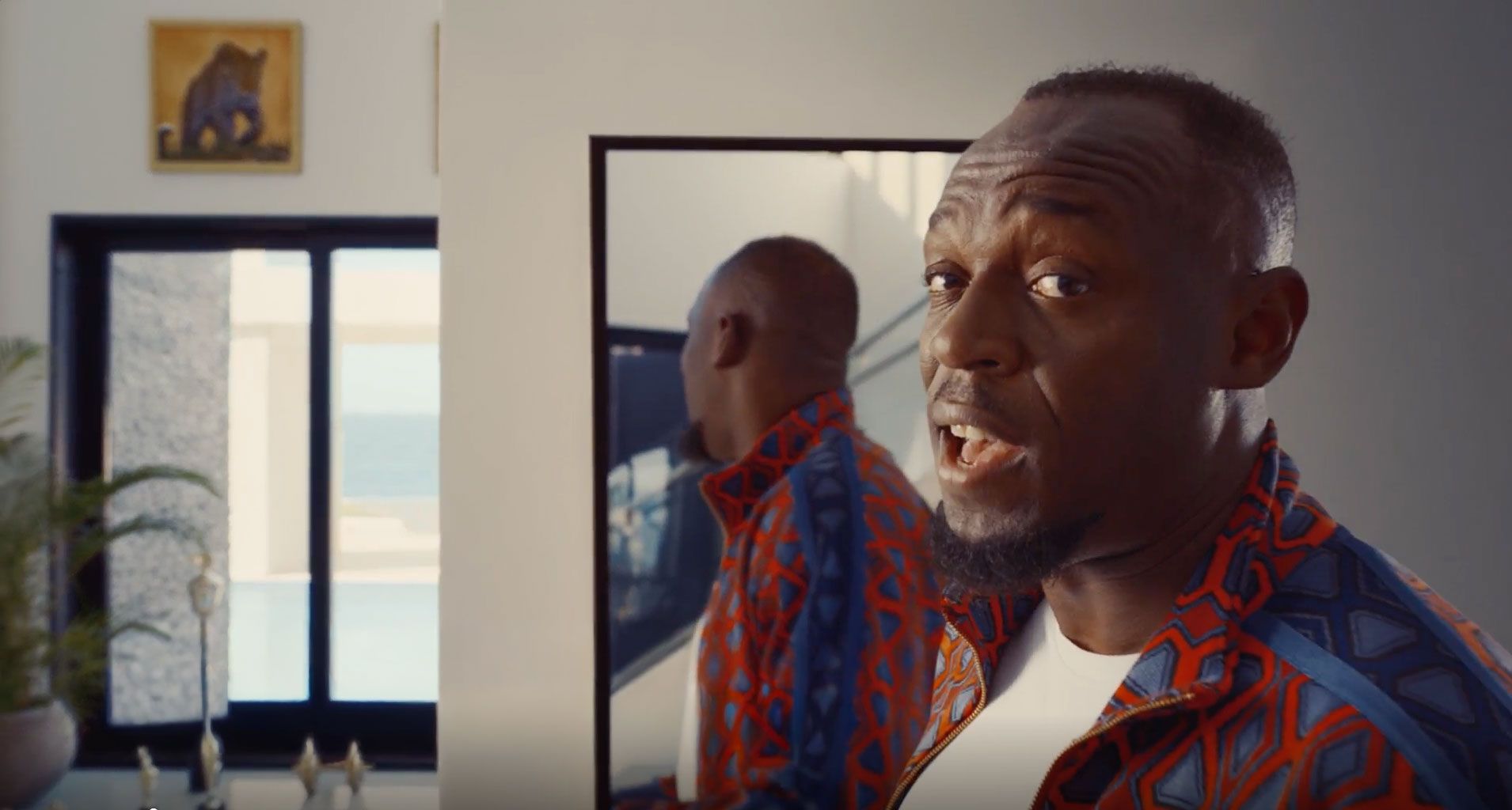 The athlete Usain Bolt showing in a campaign ad how fast the new Persil Wonder Wash products work.