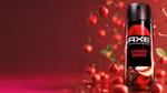 One of the latest fine fragrance variants, Cherry Spritz. A black deodorant can is in front of a red background of cherries.