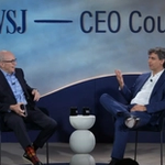 Fernando Fernandez wears a blue blazer and addresses an audience at a WSJ Leadership Institute event