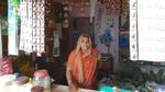 A person part of the Shakti programme in their shop selling Unilever brands such as Lux and sunsilk.