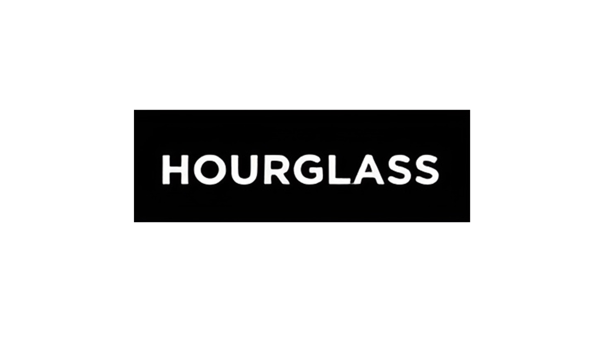 The logo for Unilever Beauty & Wellbeing’s Hourglass brand. White text, capital letters, reading ‘Hourglass’