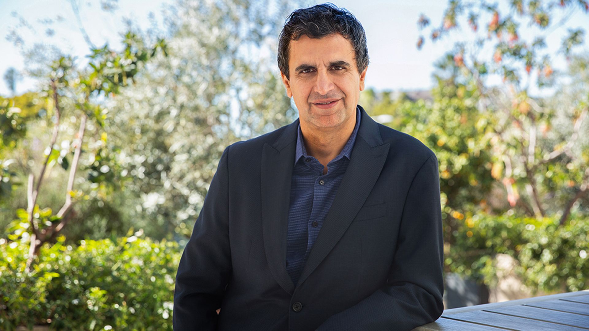 Fernando Fernandez, President of Unilever’s Beauty & Wellbeing business, pictured with a backdrop of trees