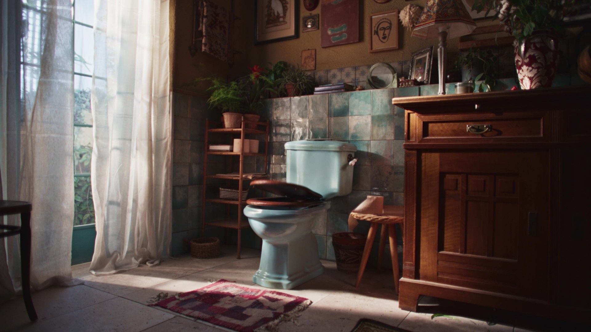 Cozy bathroom with blue toilet and wooden furniture.