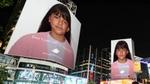 Image of a girl on billboards that state ‘Don’t just call me beautiful’ on one and ‘Call me strong’ on the other.