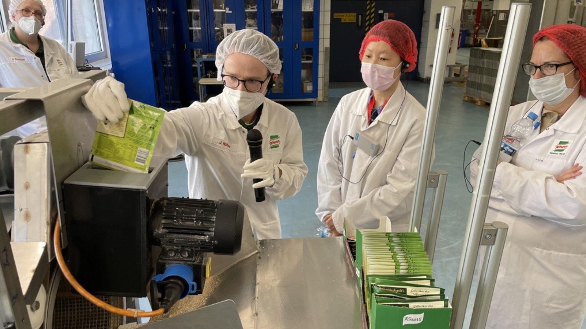 Jennifer Han looks at the machine which is offering food waste management solutions in Heilbronn