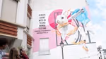 A mural of a white rabbit and a gloved hand holding a syringe. Text reads ‘Europe: stand with us to end animal testing'