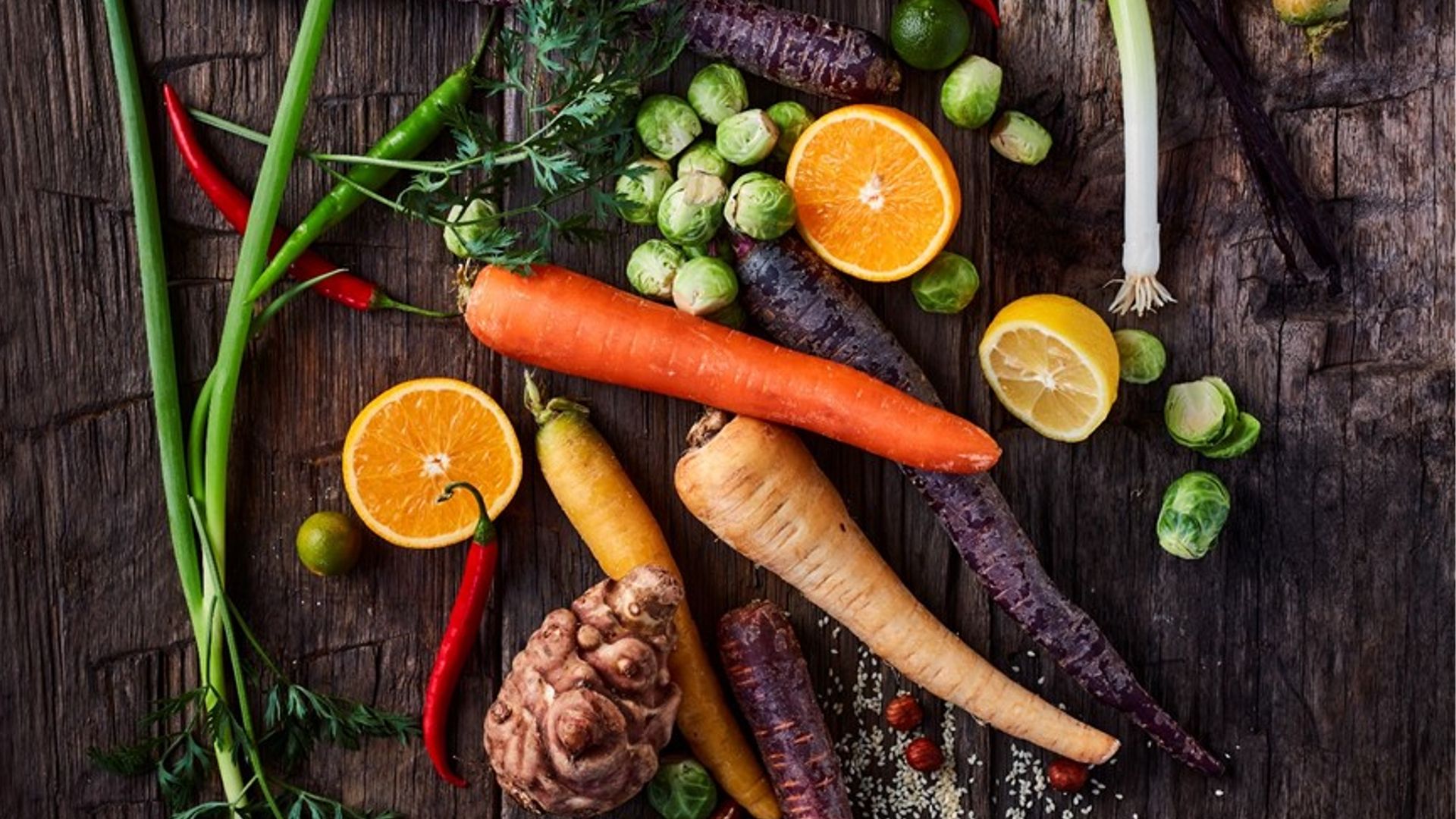 A selection of vegetables including carrots, celeriac and Brussels sprouts 