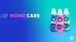Three Persil Wonder Wash bottles against a gradient blue and green background with the text 'HOME CARE' in bold pink and white letters on the left side. The Unilever logo is at the bottom right corner.