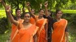 Women workers raising their hands