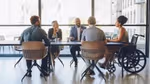 Image of a group of collaborators having a meeting