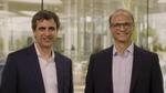 Fernando Fernandez, Unilever’s Chief Executive Officer, standing on the left and Srinivas Phatak, Unilever’s acting Chief Financial Officer, standing on the right. Both are wearing dark suits with light coloured shirts.