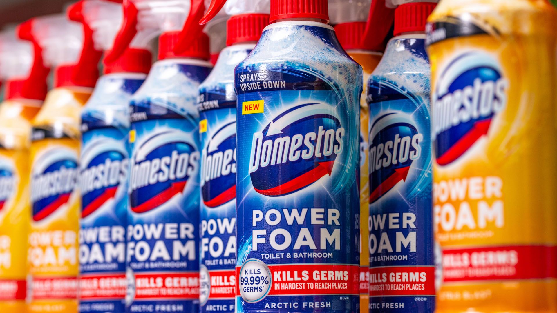 Line of Domestos Power Foam bottles on supermarket shelf. The Domestos brand sits within Unilever’s Home Care business group.