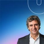 Unilever Q1 2026 results graphic featuring a portrait of Fernando Fernandez, Unilever Chief Executive Officer, shown on the right against a blue gradient background with a curved Unilever ‘U’ design element.