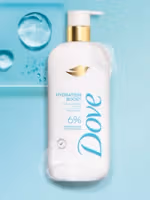 Bottle of Dove Hydration Boost body wash with water droplets and bubbles on a light blue background.