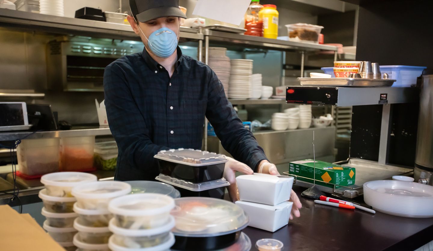 Man worker organizing a kitchen