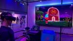 Young person wearing a VR headset controlling an avatar entering Magnum’s Pleasure Museum in the metaverse