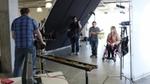 Actor and wheelchair user working on a production set