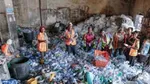 People sorting recycling