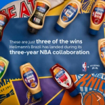 A flat‑lay image featuring various Hellmann’s flavoured mayonnaise bottles decorated with NBA team designs arranged around a blue background. Text on the background reads: “These are just three of the wins Hellmann’s Brazil has landed during its three-year NBA collaboration.” Logos for the NBA and Hellmann’s appear in the bottom right corner.