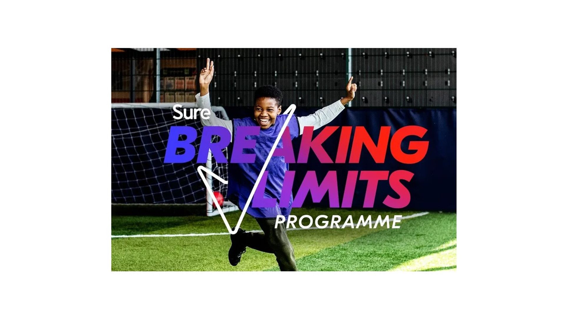 A photo of a young boy on a football pitch with his arms up. A white tick sits over him and the text reads Sure Breaking Limits programme
