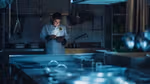 Chef in the dark looking at iPad. Unilever Food Solutions is working to help food operators cope with Covid-19