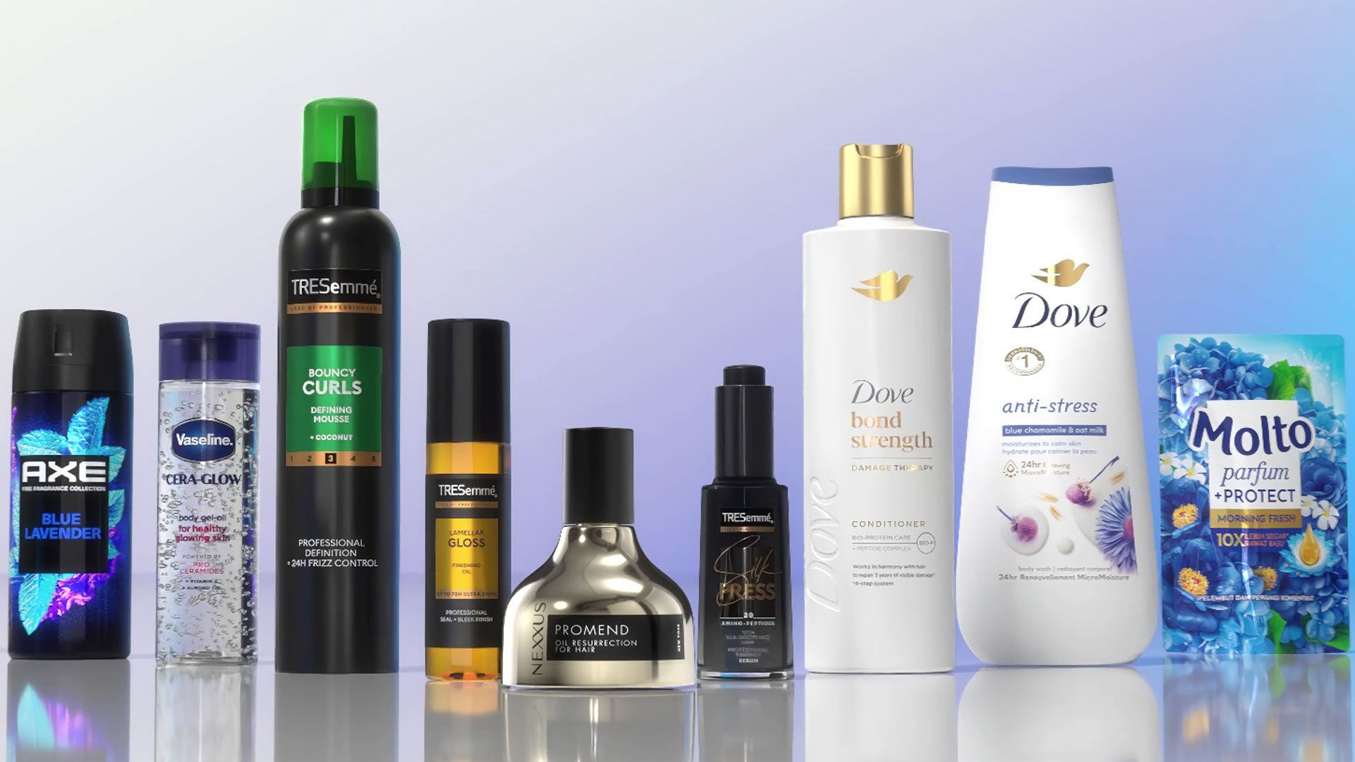 A row of Unilever products arranged side by side, including AXE Blue Lavender body spray, Vaseline serum, several TRESemmé haircare products, NEXXUS Promend, Dove Bond Strength conditioner, Dove Anti Stress body wash and Molto Perfume Protect laundry beads, on a reflective surface with a soft blue purple background.