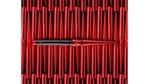 A photo of Hourglass 100% vegan and carmine-free Red Zero lipstick. One open product sits above an array of metallic red cases.